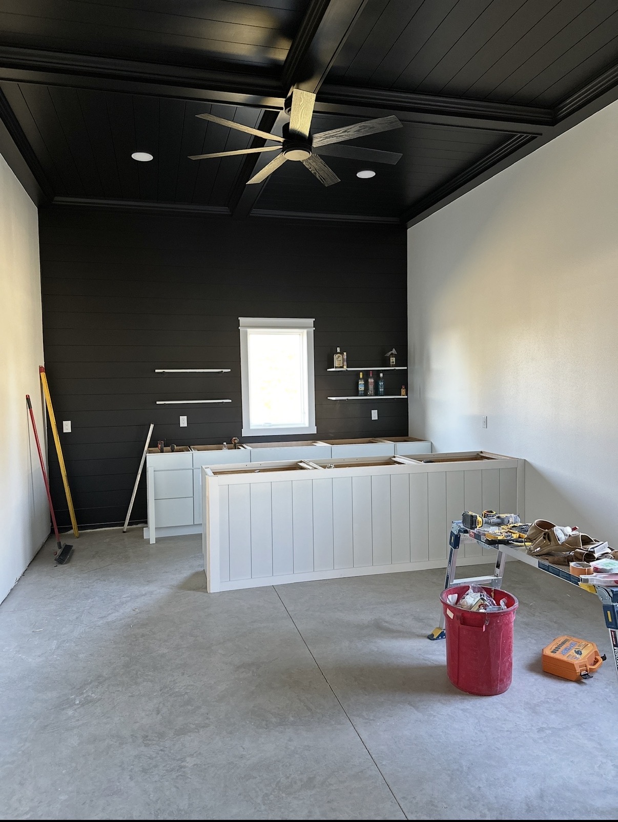 Custom black ceiling and bar finish work